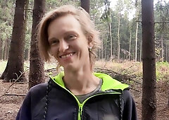 Tired-looking long-haired twink fucked in the woods