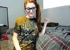 Striking redhead camgirl with small tits needs to be pleased