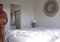 Dirty room service guy makes a bed in his fetish clothes