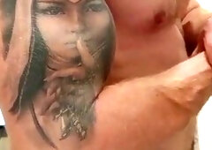 Hunky bodybuilder cleans himself, showers, and enjoys muscle worship