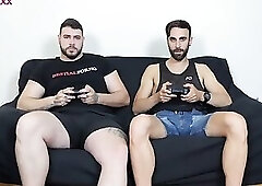 Straight friends bet while playing videogames