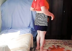 Cute sissy posing with colorful lollipop and smile