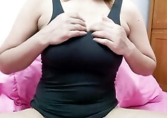 A charming wife with marvelous tits is masturbating when her spouse sees her.