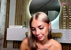 Blonde Teases in Black Lingerie