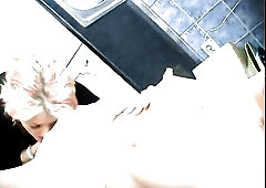 Lesbo older enjoys licking sweetheart's soaked snatch in a washroom.