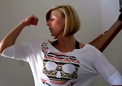 Muscular blonde MILF flexes and flashes huge fake tits during solo webcam show