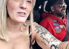 Mature blonde strips in the car