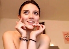 Small titted brunette teen fingering on the bed