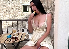 Big Tits Girl Passionately Licking Ice Cream in a Street Cafe (popsicle)