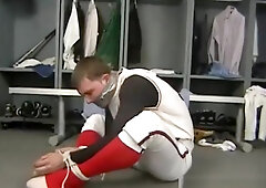 SUG Baseball player pigtied and tape gagged