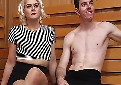 Bulky blonde t-girl bangs a dude's ass in the sauna