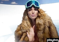 Natural redhead Elizabeth Ostrander discloses her large bazookas on a boat