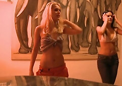 Blonde and brunette lesbians heat up a private disco lounge
