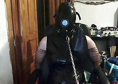 Drone tied to a chair and shackled to the table, programming plugged and in chastity with tr-breather as its body responds with waves of fun.