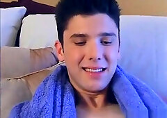 The blond boy enjoys the dark haired boy