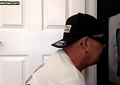 Experienced man at the gloryhole expertly deepthroats a throbbing cock while stroking it