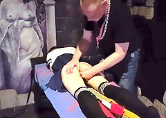 BDSM session with a belt and caning from a dominating mommy