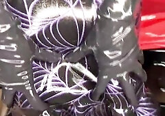 My ally and I step into the frame like 2 true Mistresses. We are wearing form-fitting latex tops, latex skirts, and haunch-high boots with extraordina