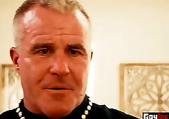 Studs rub each others cocks and fistfucks inside church