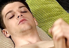 Twink pulls his big cock out to jerk off solo