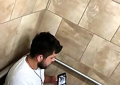 Jacking off in public bathroom