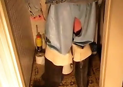 nlboots - torn rubber trousers, fur jacket, waders, biffy