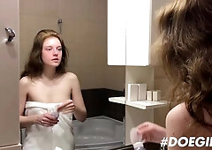 Wet in the Sienna Kim shower she rubs soap down her thigh and pussy
