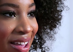 Curly-haired ebony pornstar Lala Ivey looks amazing in a see-through lingerie