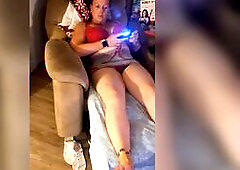 Filming up white cutie gal's micro mini suit during the time that this babe's playing fortnite and that babe's loving it