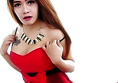 Brunette Asian tranny Yoghurt drains her nuts in bed solo