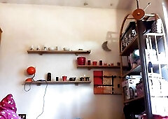 Nicoletta cleans an old attic wearing a giant bawdy diaper below her pants