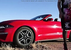 Mrs Samantha is sensually playing with and on her red Mustang convertible wearing equally red high heels, somewhere in de vast desert of Arizona. Lots