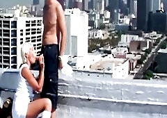 This experienced blond widens wide and squirts hard as that babe takes each inch on the open rooftop with cum leaking down her haunches.