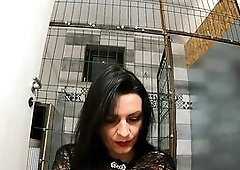 I’m clothed in a sheer lace robe, bright red underware and a skin-constricted ebony bodystocking when I start dancing not fast in front of the cage.