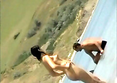 Dude peeks on a gal who undresses before swimming