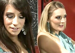 Brunette Hair tgirl lady Brenda Von Tease seduces tall blond shoe shop owner Mona Wales and screws her mouth then fingers her oiled booty and cunt