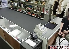 Dude blows a cock behind counter in a public shop