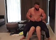 Guy Stripping Out Of A Cop Uniform and Giving A Client A Lap Dance