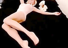 Lavish blonde shemale in a tight dress strokes her boner