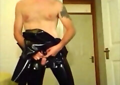 Suiting up in rubber catsuit