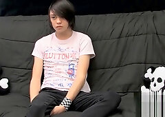 Emo twink Roxy Red enjoys a glass dildo while he wanks