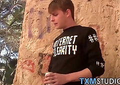 Blonde twunk eats two cocks in public