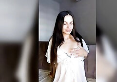 Pretty wench in white underware shows her bazookas????