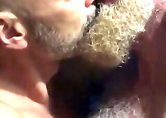 He resists being kissed....a bit