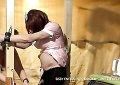 Sissy is filled with a three liter milk enema via a peculiar plug and looks like that babe's 3 months preggo at the end.