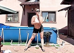 Dance and undress undressed outdoor in my yard , next to the pool , masturbate and squirt on the ground then get over here pool at the end to nifty of
