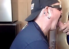 Mature gay dude gives a blowjob through a gloryhole in a homemade video