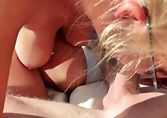 Sucking a big cock outdoors on a sunbed.