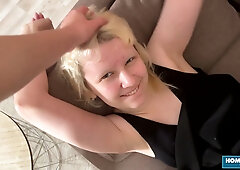 Blonde girlfriend Kate takes his cock deep in the mouth and rides him from behind on the couch