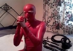 Red Latex Catsuit with Restraints (1 of 2)